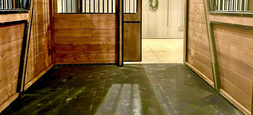 Horse stall with an open door, idea solution for horse stall flooring
